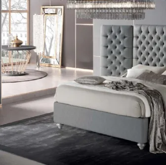 Letto con testiera trapuntata dal design elegante Puccini di Stilfar