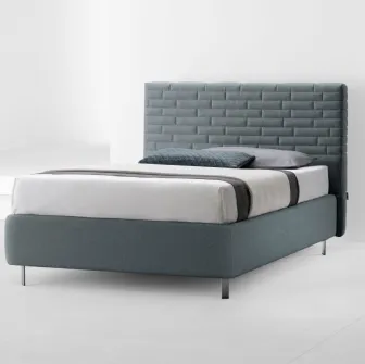 Letto Wall Thin Young a una piazza e mezza con testiera trapuntata dal design a mattoni di Stilfar Italia