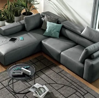 Divano relax in pelle con penisola Dado di Calligaris