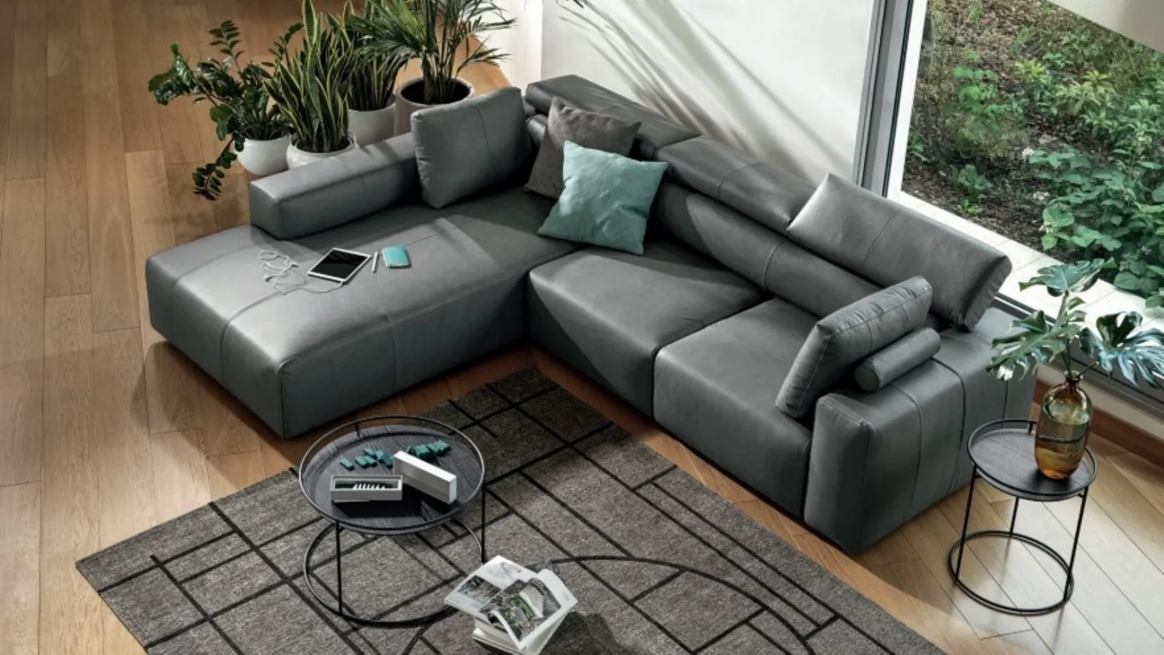 Divano relax in pelle con penisola Dado di Calligaris