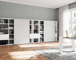 Libreria a muro con ante scorrevoli di Colombini Office